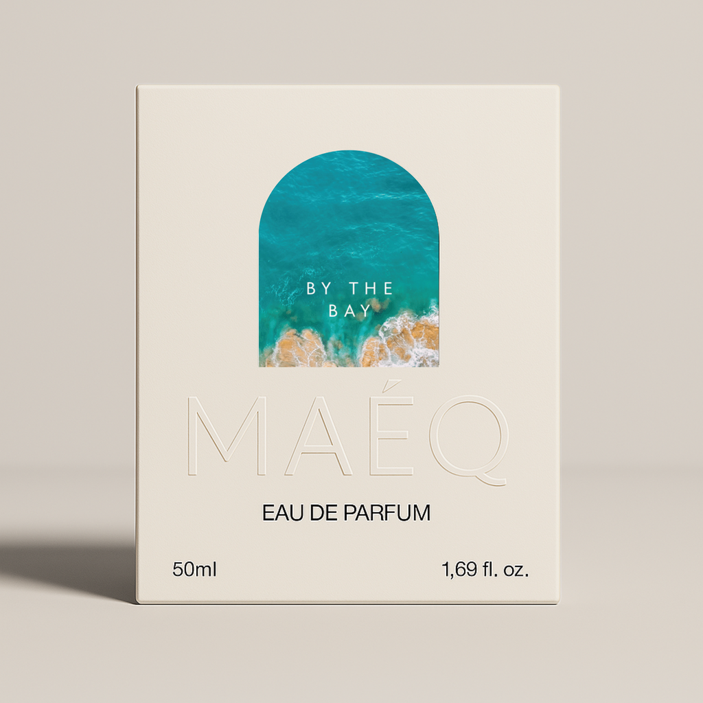 minimal white box packaging of maeq perfume by the bay with blue card