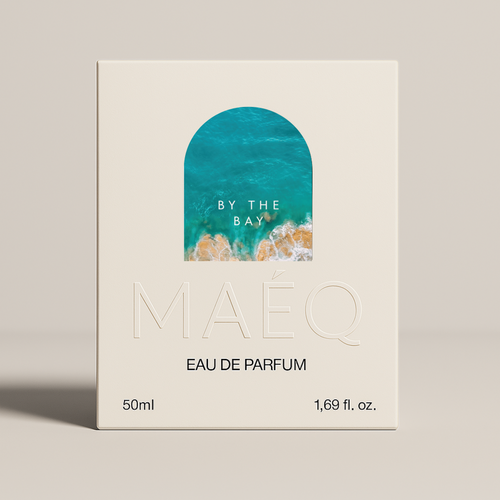 minimal white box packaging of maeq perfume by the bay with blue card